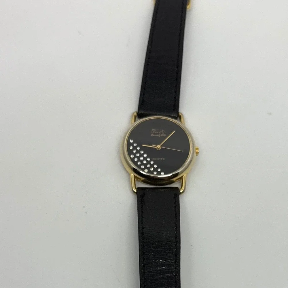 1980s Tali Beverly Hills Watch Rhinestone Accent Gold Tone Black‎ Face Quartz